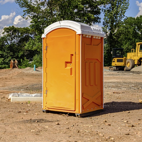 how often are the portable restrooms cleaned and serviced during a rental period in Coy